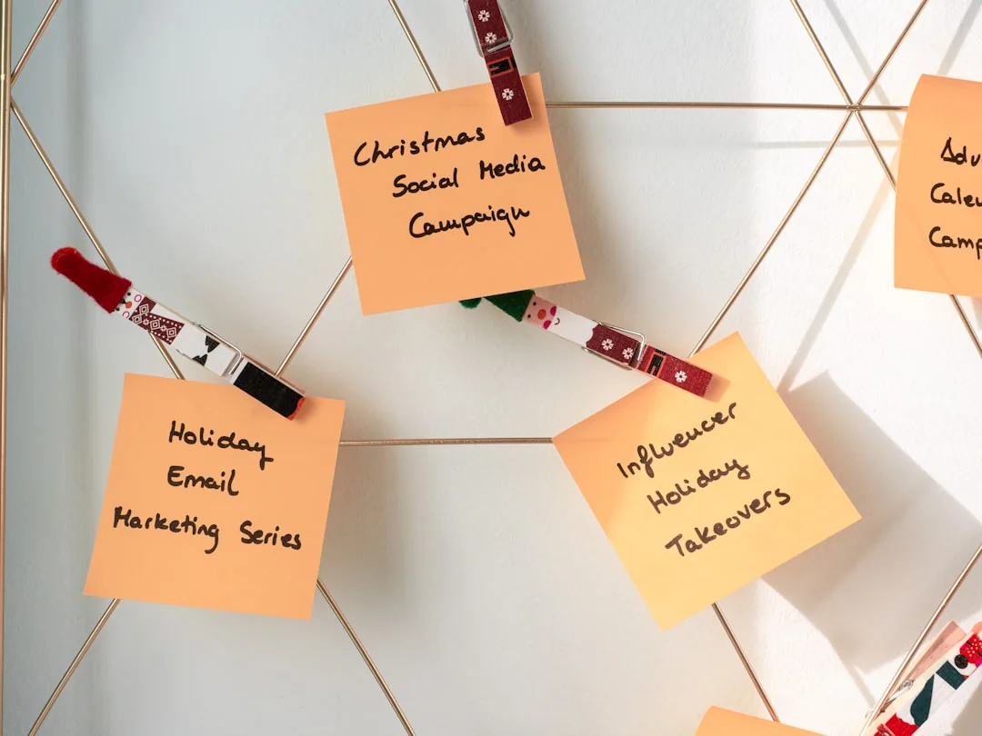 Close-up of a woman working on a digital marketing project in a home office setting.